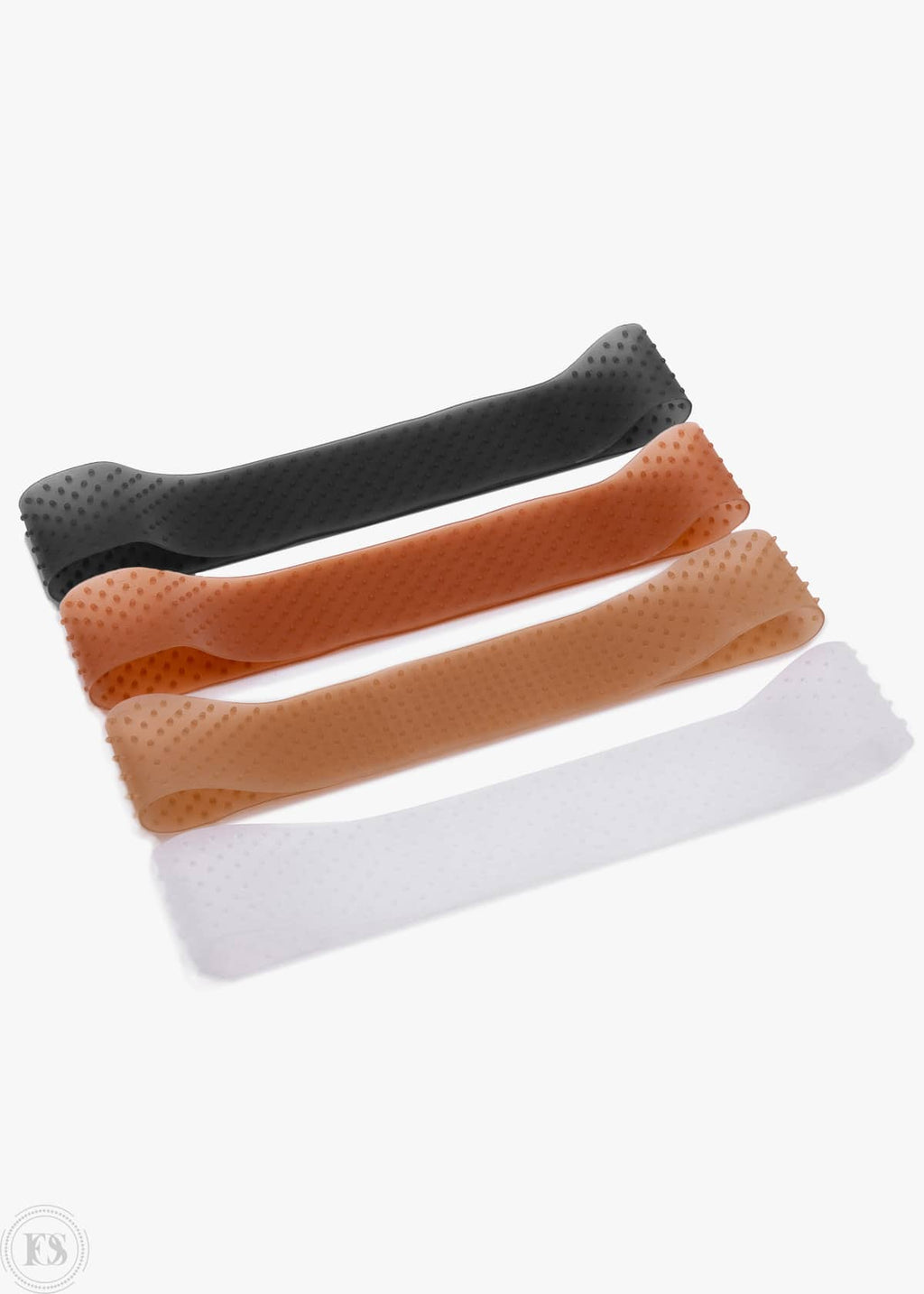 Fyra silikonbaserade perukgrepp i svart, beige, brun och transparent färg, med halkfri yta och små prickar som ger stabil och bekväm passform.