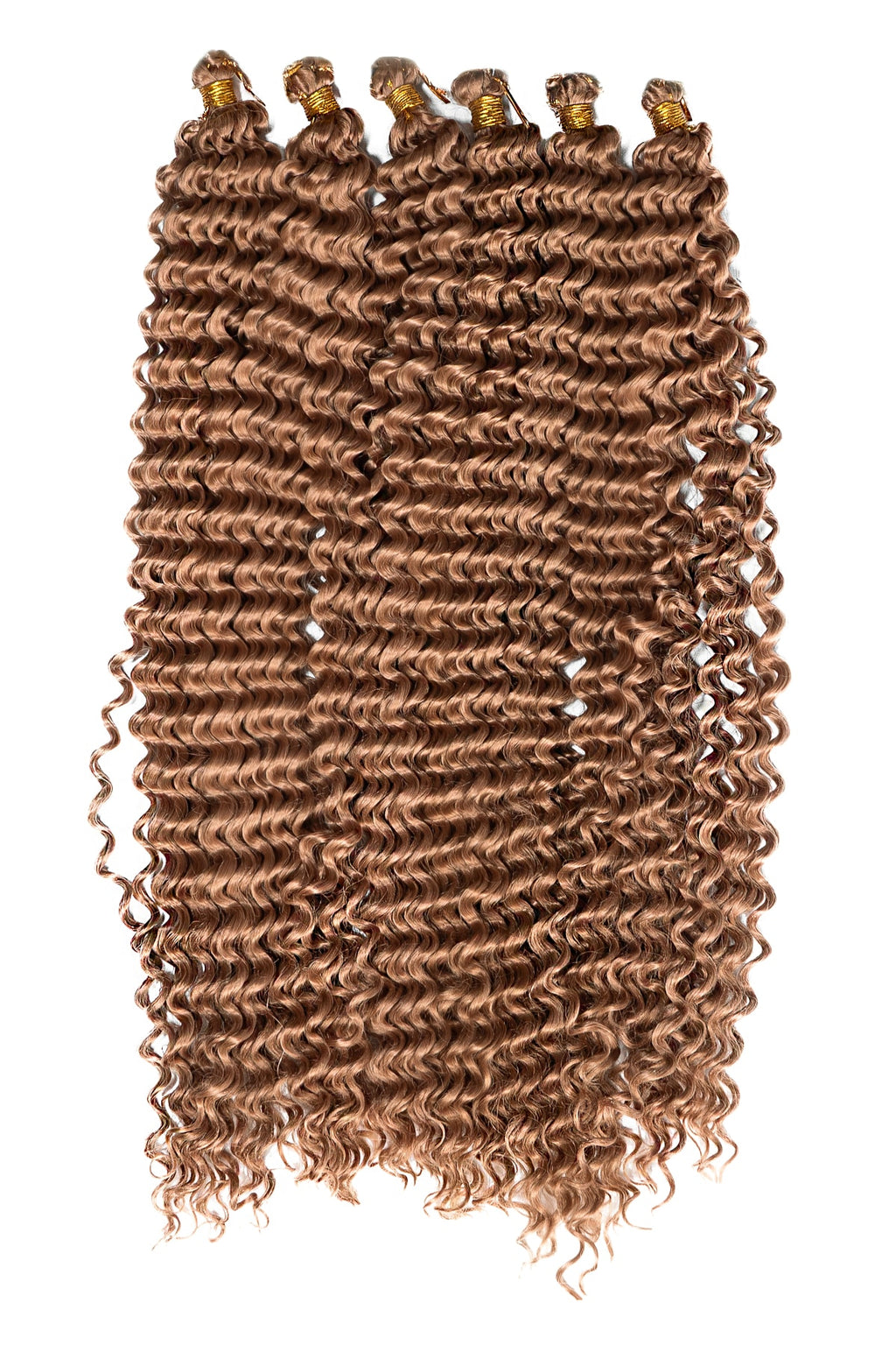 Tätt definierade Boho lockar med naturlig glans som ger volym, struktur och en levande, lyxig frisyr i karamellbrun färg.