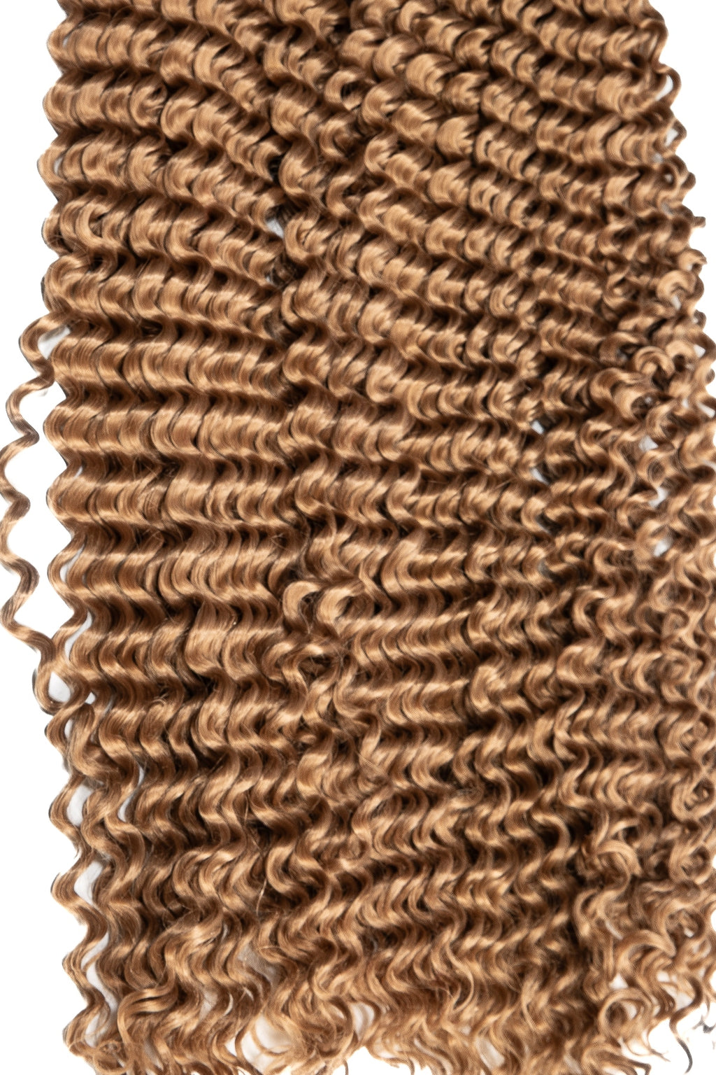 Ombre hår i brun färg med mjuka spiral-lockar för flätning eller extensions med naturlig glans. Boho braids.