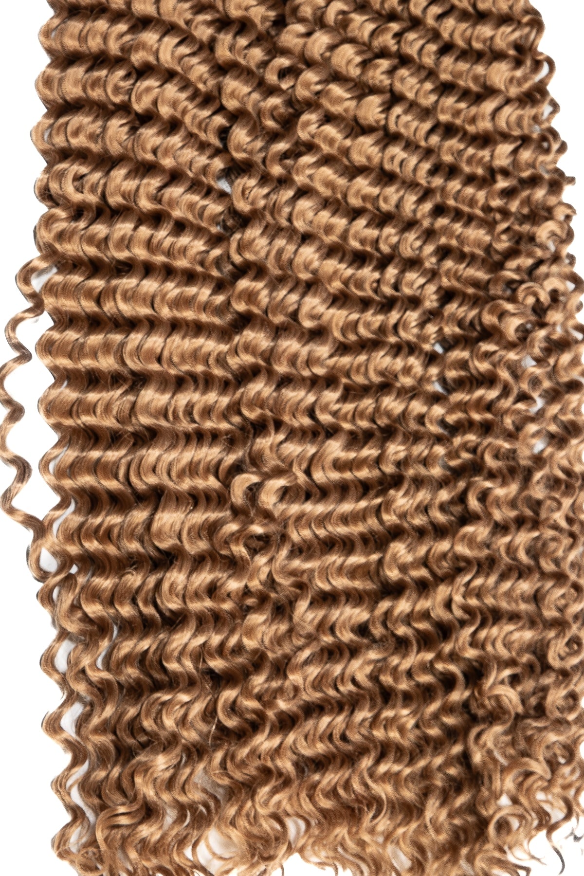 Ombre hår i brun färg med mjuka spiral-lockar för flätning eller extensions med naturlig glans. Boho braids.