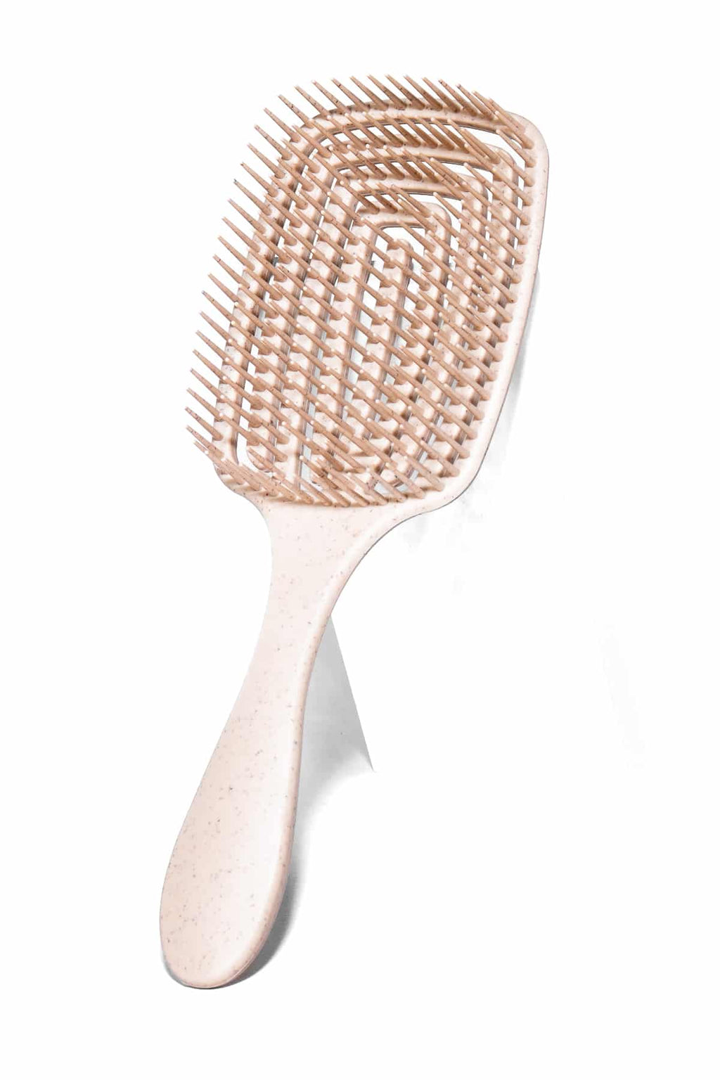 Detailer paddelborste i beige färg står mot vit bakgrund. Motverkar friss och trassligt hår.