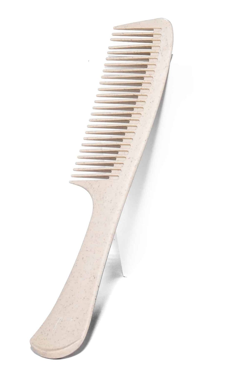 Beige bredtandad kam som förenklar utredning av hår och skapar eleganta lockar.