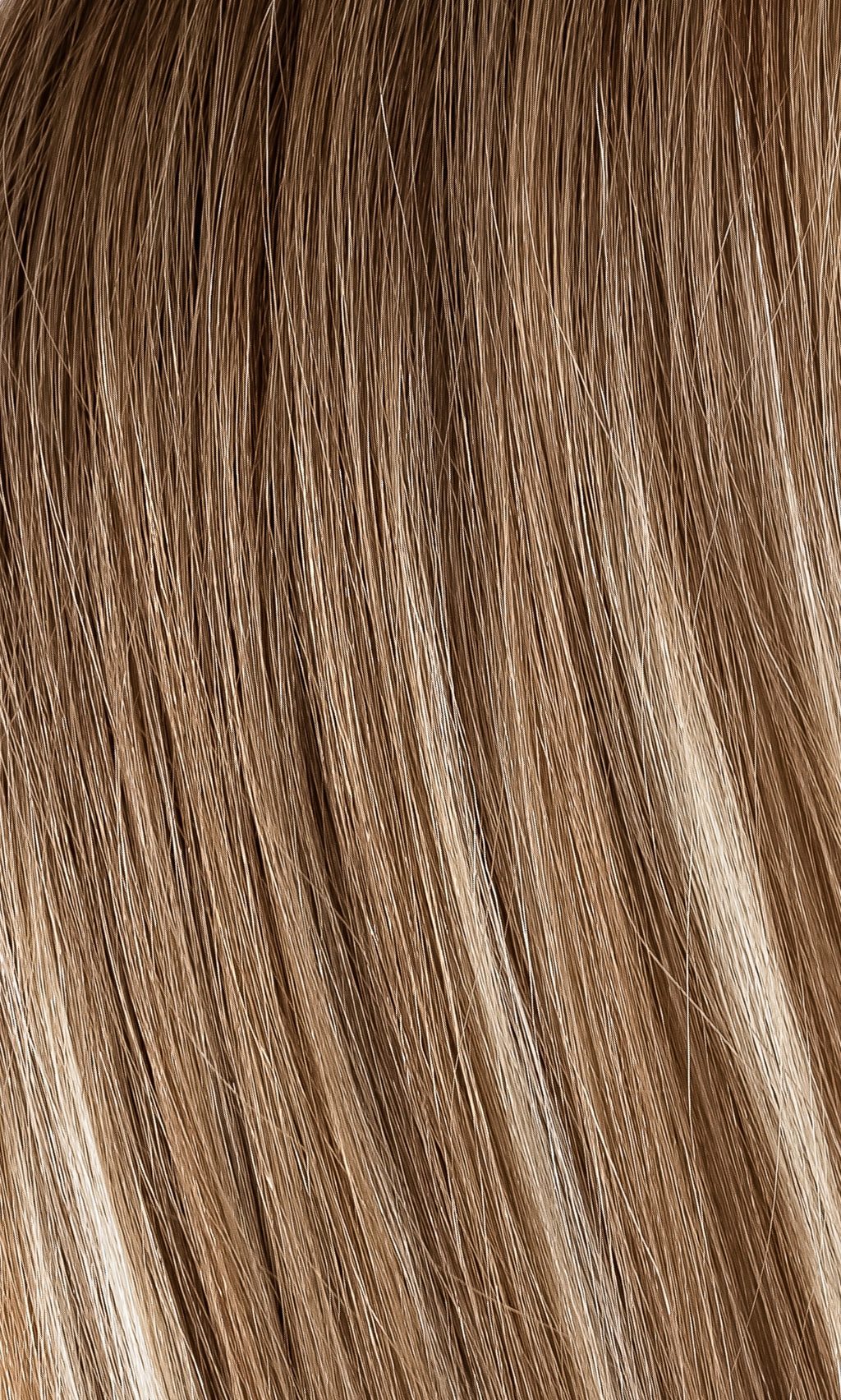 Närbild på äkta hår extensions med slingor, som visar en blandning av brunt och blont Remy-hår, med naturlig glans och mjuka övergångar för en volymrik och realistisk look