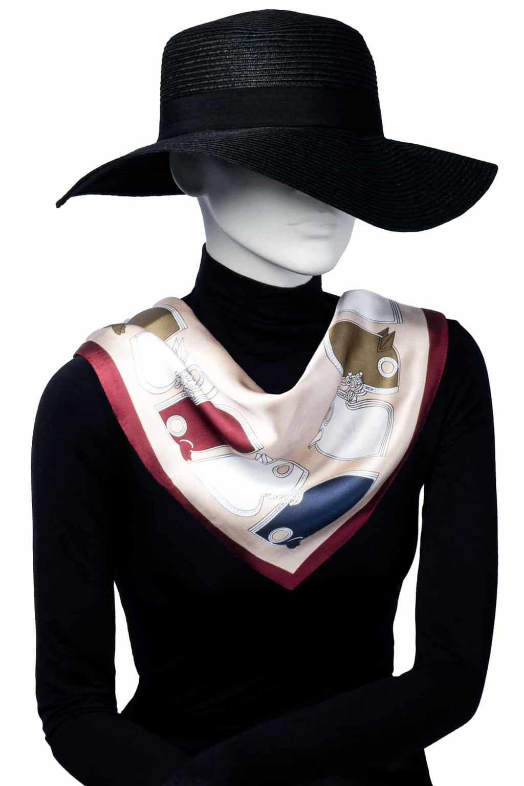 Scarf i beige med mönster i rött, blått och guld – lyxig accessoar för hals eller hår.