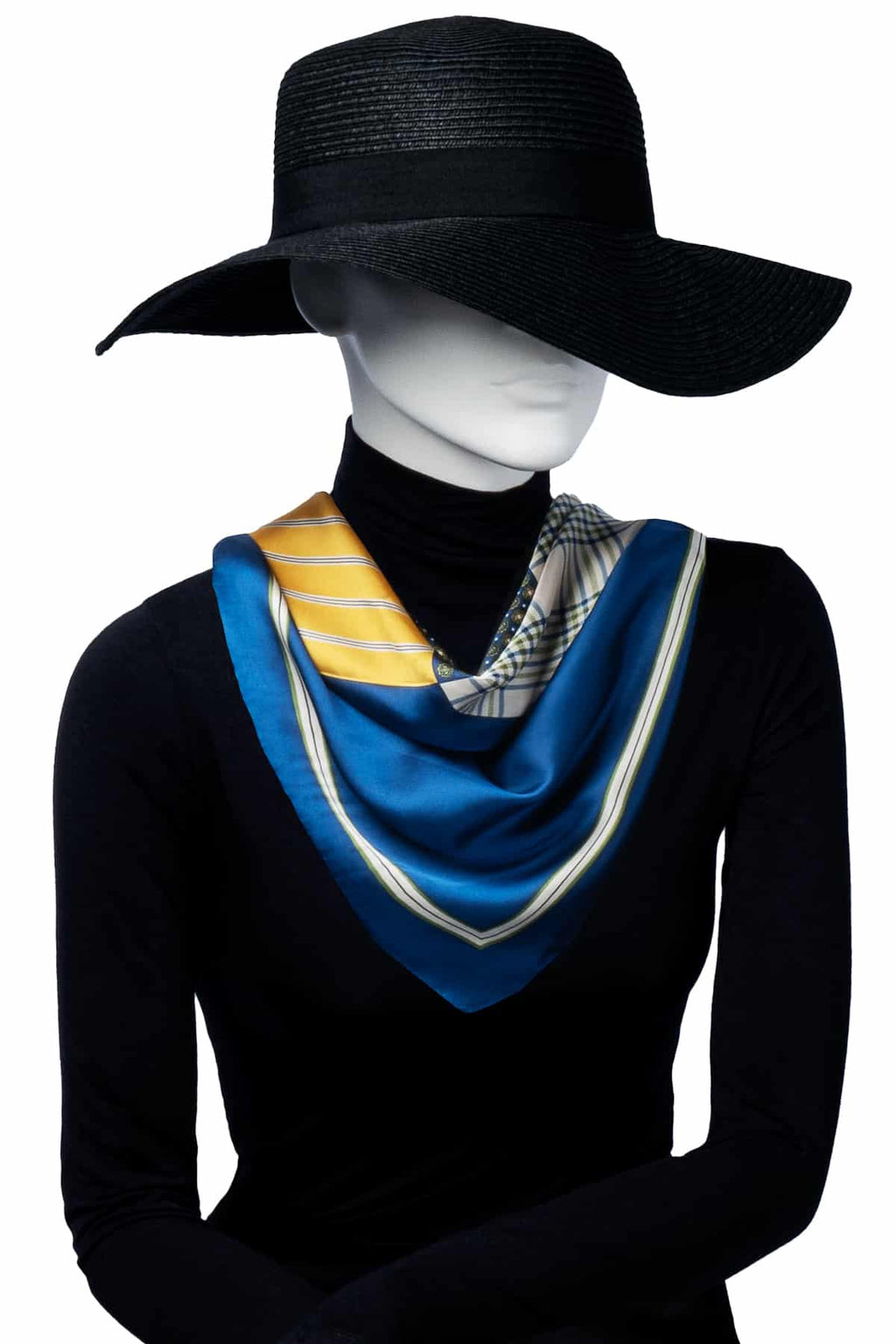scarf i blå, gul och vit ton med randigt och rutigt mönster. Ger en elegant, färgstark touch.
