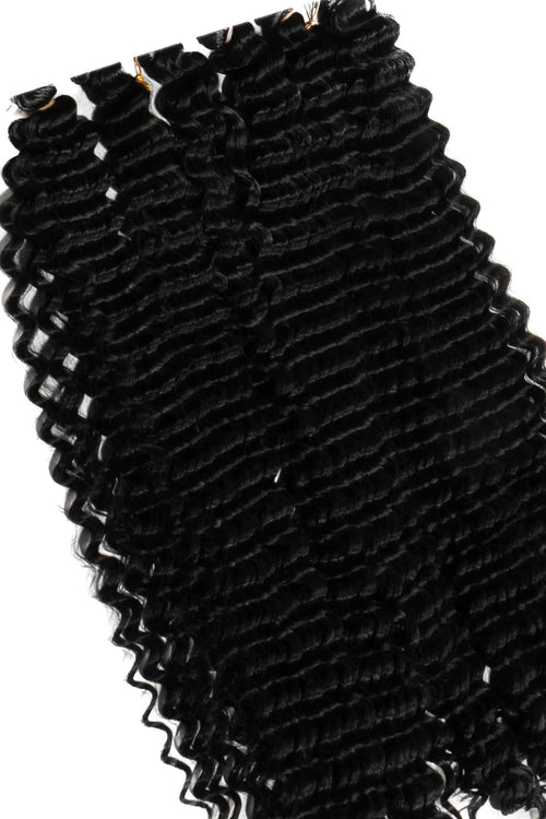 Boho hårförlängningar i djup svart ton, perfekta boho flätor. Mjukt syntetiskt fiber med naturlig glans som ger volym och en elegant, definierad look.