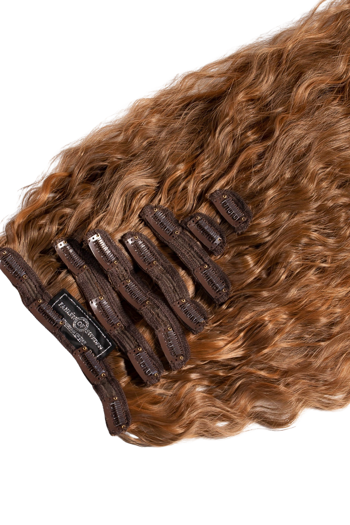 Clip in-set i mjuka vågor med varm brun nyans, äkta hår med naturlig glans och flexibla klämmor för enkel applicering och volym.